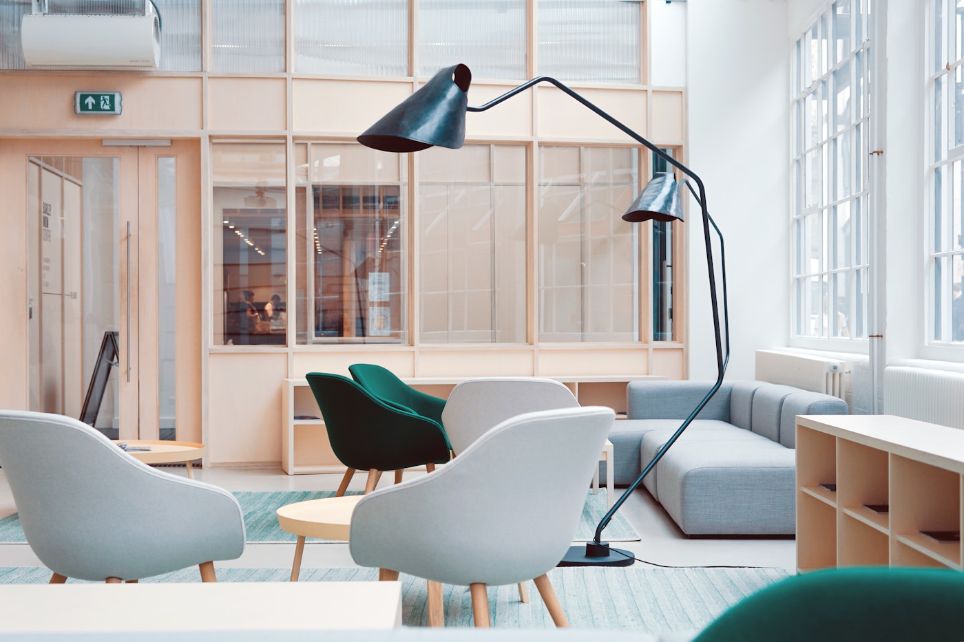 Bright empty office lounge with nobody available to answer